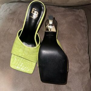 Square shaped green heels